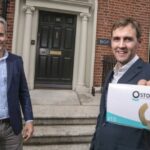 Kevin Kelleher CEO of Ostoform holding a box of the Ostoform Seal outside BGF building